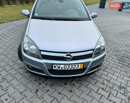 Серый Опель Астра, объемом двигателя 1.8 л и пробегом 211 тыс. км за 4499 $, фото 35 на Automoto.ua