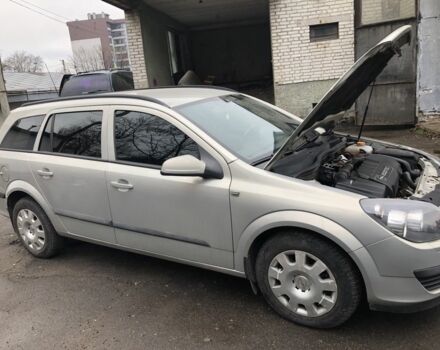 Серый Опель Астра, объемом двигателя 1.2 л и пробегом 260 тыс. км за 4800 $, фото 4 на Automoto.ua