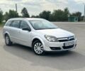 Серый Опель Астра, объемом двигателя 1.8 л и пробегом 260 тыс. км за 2800 $, фото 1 на Automoto.ua
