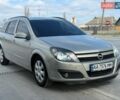 Серый Опель Астра, объемом двигателя 1.6 л и пробегом 240 тыс. км за 4600 $, фото 1 на Automoto.ua
