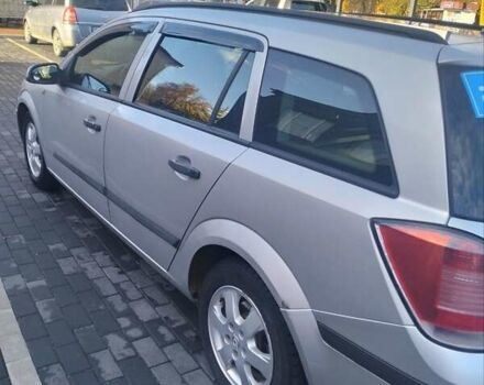 Серый Опель Астра, объемом двигателя 1.6 л и пробегом 220 тыс. км за 5000 $, фото 2 на Automoto.ua