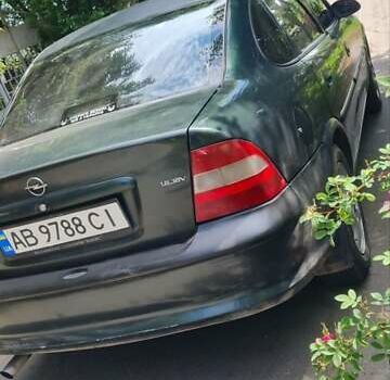 Серый Опель Астра, объемом двигателя 2 л и пробегом 178 тыс. км за 2550 $, фото 5 на Automoto.ua