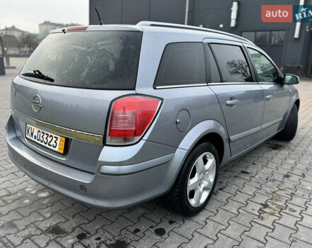 Серый Опель Астра, объемом двигателя 1.8 л и пробегом 211 тыс. км за 4499 $, фото 18 на Automoto.ua