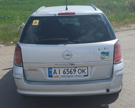 Серый Опель Астра, объемом двигателя 1.8 л и пробегом 420 тыс. км за 4400 $, фото 1 на Automoto.ua