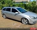 Серый Опель Астра, объемом двигателя 1.7 л и пробегом 296 тыс. км за 6000 $, фото 1 на Automoto.ua