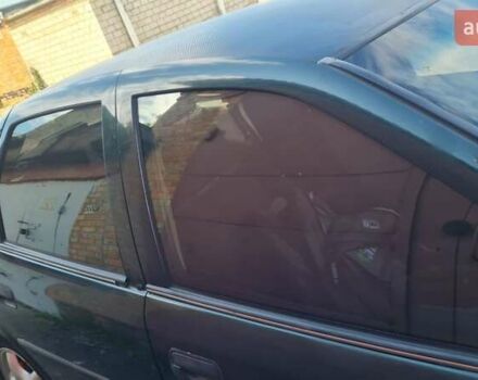 Серый Опель Астра, объемом двигателя 2 л и пробегом 178 тыс. км за 2550 $, фото 2 на Automoto.ua