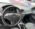 Сірий Опель Астра, об'ємом двигуна 1.69 л та пробігом 257 тис. км за 4950 $, фото 7 на Automoto.ua