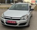Серый Опель Астра, объемом двигателя 1.4 л и пробегом 230 тыс. км за 4950 $, фото 1 на Automoto.ua