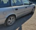Серый Опель Астра, объемом двигателя 2 л и пробегом 207 тыс. км за 500 $, фото 2 на Automoto.ua