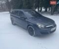 Серый Опель Астра, объемом двигателя 1.25 л и пробегом 212 тыс. км за 5000 $, фото 1 на Automoto.ua