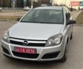 Серый Опель Астра, объемом двигателя 1.4 л и пробегом 230 тыс. км за 5700 $, фото 1 на Automoto.ua