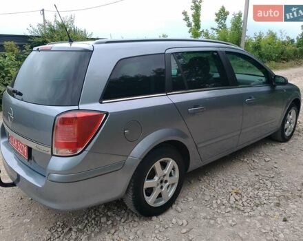 Серый Опель Астра, объемом двигателя 1.6 л и пробегом 206 тыс. км за 5000 $, фото 7 на Automoto.ua