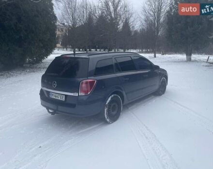 Серый Опель Астра, объемом двигателя 1.25 л и пробегом 212 тыс. км за 5000 $, фото 2 на Automoto.ua