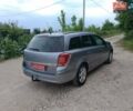Серый Опель Астра, объемом двигателя 1.6 л и пробегом 206 тыс. км за 5400 $, фото 19 на Automoto.ua