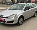 Серый Опель Астра, объемом двигателя 1.4 л и пробегом 230 тыс. км за 5700 $, фото 2 на Automoto.ua