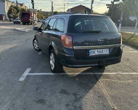 Серый Опель Астра, объемом двигателя 1.2 л и пробегом 323 тыс. км за 4200 $, фото 3 на Automoto.ua