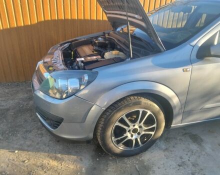 Серый Опель Астра, объемом двигателя 1 л и пробегом 240 тыс. км за 4200 $, фото 6 на Automoto.ua