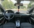Серый Опель Астра, объемом двигателя 1.9 л и пробегом 199 тыс. км за 5800 $, фото 11 на Automoto.ua