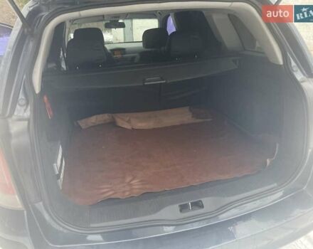 Серый Опель Астра, объемом двигателя 1.25 л и пробегом 212 тыс. км за 5000 $, фото 6 на Automoto.ua