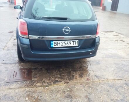 Серый Опель Астра, объемом двигателя 1.2 л и пробегом 425 тыс. км за 4200 $, фото 2 на Automoto.ua