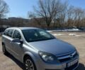 Серый Опель Астра, объемом двигателя 1.6 л и пробегом 316 тыс. км за 3999 $, фото 3 на Automoto.ua