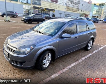 Серый Опель Астра, объемом двигателя 1.4 л и пробегом 243 тыс. км за 5200 $, фото 3 на Automoto.ua