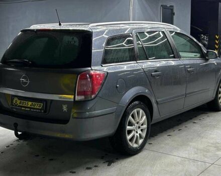 Серый Опель Астра, объемом двигателя 1.6 л и пробегом 249 тыс. км за 5700 $, фото 5 на Automoto.ua