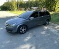 Серый Опель Астра, объемом двигателя 1.6 л и пробегом 242 тыс. км за 4900 $, фото 1 на Automoto.ua