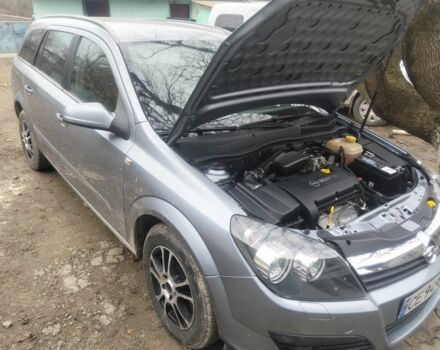 Серый Опель Астра, объемом двигателя 1 л и пробегом 240 тыс. км за 4200 $, фото 5 на Automoto.ua