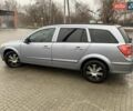 Серый Опель Астра, объемом двигателя 1.6 л и пробегом 234 тыс. км за 4900 $, фото 1 на Automoto.ua