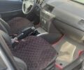 Серый Опель Астра, объемом двигателя 1 л и пробегом 240 тыс. км за 4200 $, фото 1 на Automoto.ua