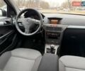 Серый Опель Астра, объемом двигателя 1.4 л и пробегом 230 тыс. км за 5400 $, фото 23 на Automoto.ua