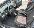 Серый Опель Астра, объемом двигателя 1.4 л и пробегом 285 тыс. км за 3800 $, фото 6 на Automoto.ua