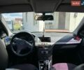 Серый Опель Астра, объемом двигателя 1.6 л и пробегом 230 тыс. км за 5000 $, фото 13 на Automoto.ua