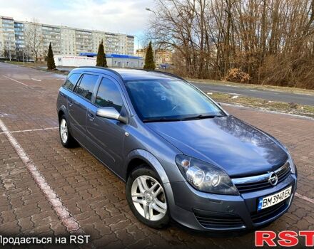 Серый Опель Астра, объемом двигателя 1.4 л и пробегом 243 тыс. км за 5200 $, фото 1 на Automoto.ua