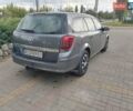 Серый Опель Астра, объемом двигателя 1.3 л и пробегом 329 тыс. км за 3900 $, фото 8 на Automoto.ua