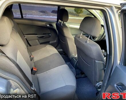 Серый Опель Астра, объемом двигателя 1.4 л и пробегом 243 тыс. км за 5200 $, фото 8 на Automoto.ua