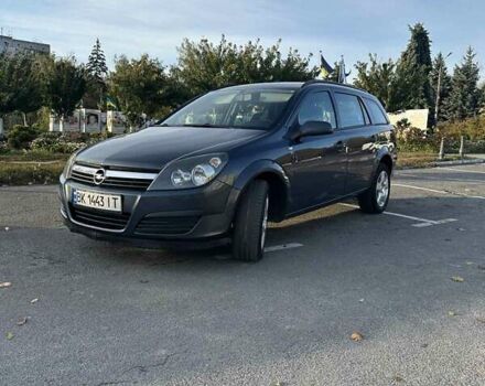 Серый Опель Астра, объемом двигателя 1.2 л и пробегом 323 тыс. км за 4200 $, фото 1 на Automoto.ua