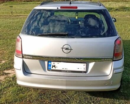 Серый Опель Астра, объемом двигателя 1.9 л и пробегом 258 тыс. км за 4400 $, фото 10 на Automoto.ua