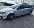 Серый Опель Астра, объемом двигателя 1.6 л и пробегом 242 тыс. км за 5650 $, фото 1 на Automoto.ua