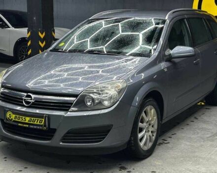 Серый Опель Астра, объемом двигателя 1.6 л и пробегом 249 тыс. км за 5700 $, фото 2 на Automoto.ua