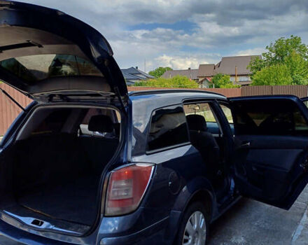 Серый Опель Астра, объемом двигателя 1.9 л и пробегом 293 тыс. км за 3900 $, фото 6 на Automoto.ua