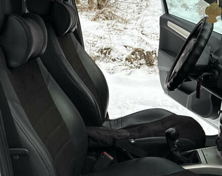 Серый Опель Астра, объемом двигателя 1.9 л и пробегом 428 тыс. км за 5800 $, фото 24 на Automoto.ua