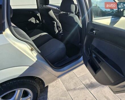 Серый Опель Астра, объемом двигателя 1.3 л и пробегом 238 тыс. км за 4800 $, фото 23 на Automoto.ua