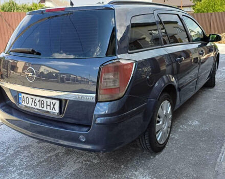 Серый Опель Астра, объемом двигателя 1.9 л и пробегом 293 тыс. км за 3900 $, фото 12 на Automoto.ua
