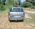 Серый Опель Астра, объемом двигателя 1.8 л и пробегом 245 тыс. км за 5600 $, фото 2 на Automoto.ua