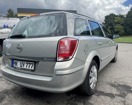 Серый Опель Астра, объемом двигателя 1.6 л и пробегом 205 тыс. км за 3999 $, фото 4 на Automoto.ua