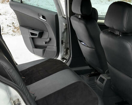 Серый Опель Астра, объемом двигателя 1.9 л и пробегом 428 тыс. км за 5800 $, фото 13 на Automoto.ua