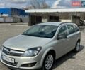 Серый Опель Астра, объемом двигателя 1.6 л и пробегом 242 тыс. км за 5300 $, фото 2 на Automoto.ua