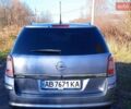 Серый Опель Астра, объемом двигателя 1.9 л и пробегом 249 тыс. км за 5500 $, фото 12 на Automoto.ua